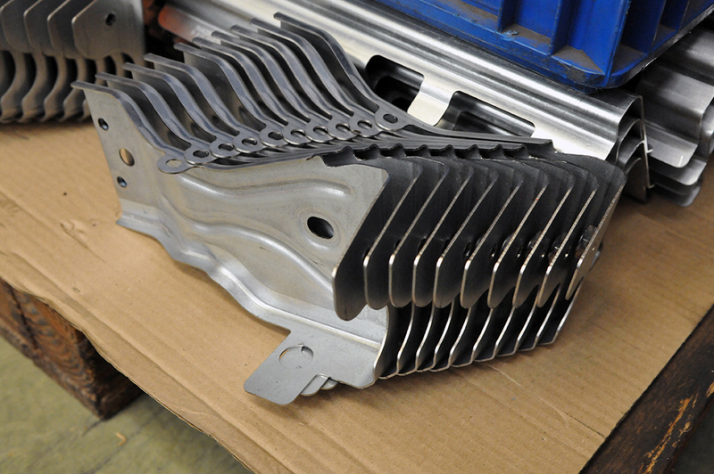 Élément de structure embouti en acier.